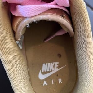Gold and pink Nike Air Force ones